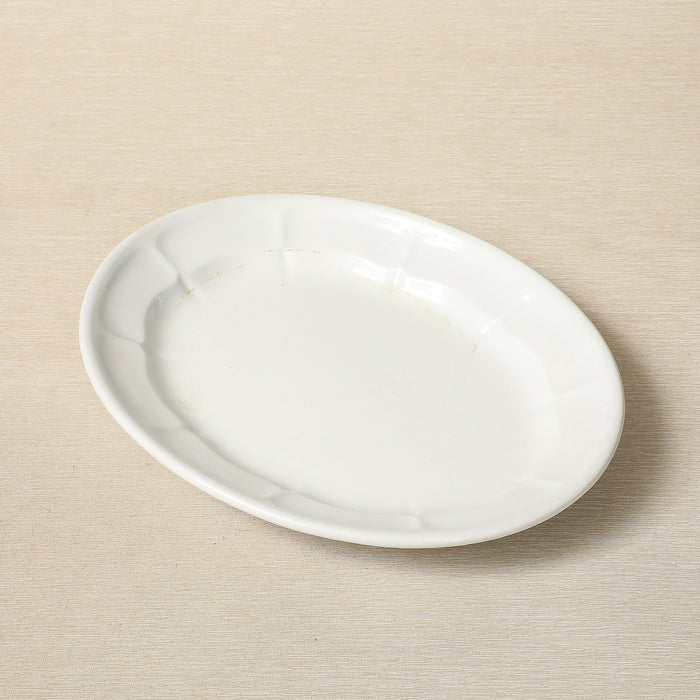 An Elsmore & Forster oval ironstone serving dish with scalloped interior c. 1871