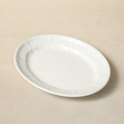 An Elsmore & Forster oval ironstone serving dish with scalloped interior c. 1871