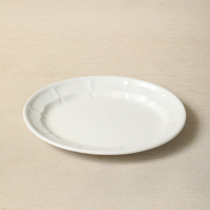 An Elsmore & Forster oval ironstone serving dish with scalloped interior c. 1871
