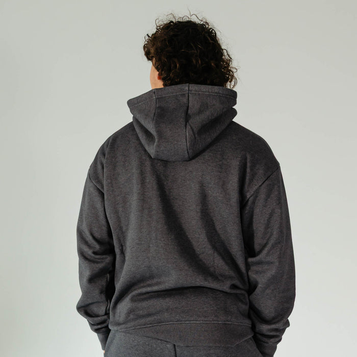 Adult model wearing Gray Baseline hoodie