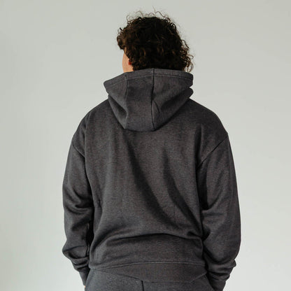 Adult model wearing Gray Baseline hoodie