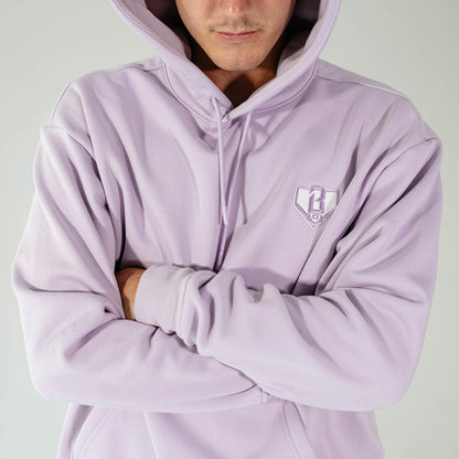Adult model wearing Purple Baseline hoodie