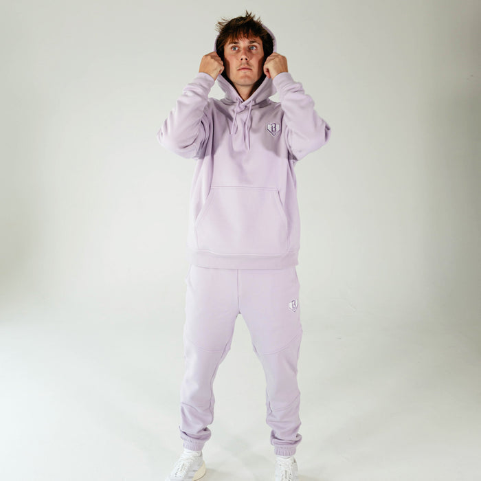Adult model wearing Purple Baseline hoodie