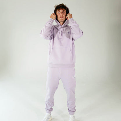 Adult model wearing Purple Baseline hoodie