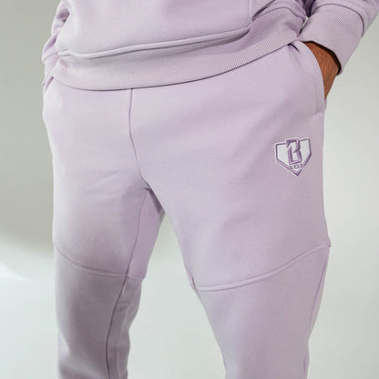 Adult model wearing Purple Baseline joggers