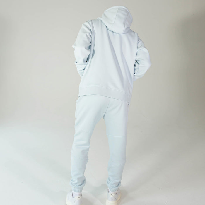 Adult model wearing Blue Baseline joggers