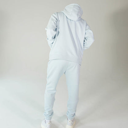 Adult model wearing Blue Baseline joggers