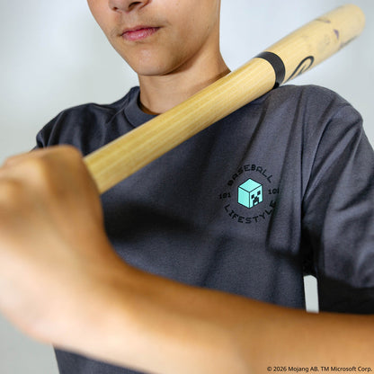 Youth model wearing gray youth graphic tee with "BL101 X Minecraft Athletics" design