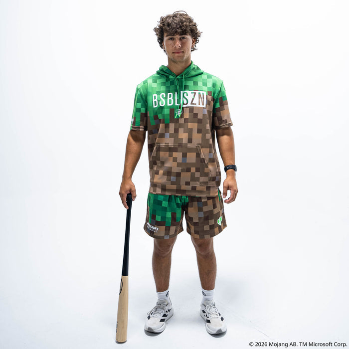 Adult model wearing multi-color BL101 X Minecraft BSBL-SZN V3 Grass Block short sleeve hoodie