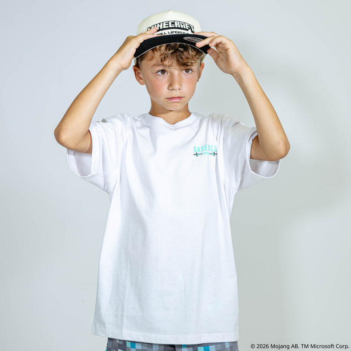 Youth model wearing white youth graphic tee with "BL101 X Minecraft Diamond Sword Authentic" design