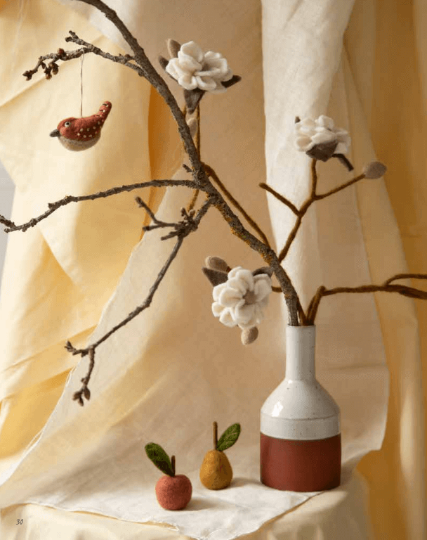 felt magnolia branch in terracotta vase