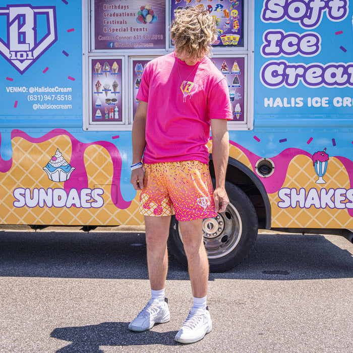 Adult model wearing pink Ice Cream Strawberry Banana shorts