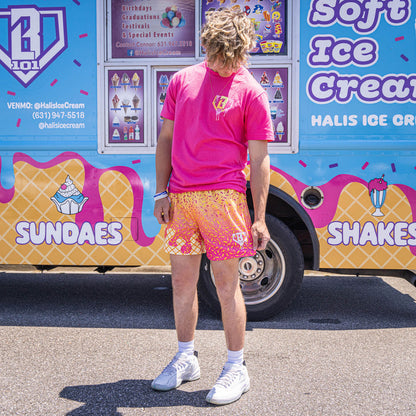 Adult model wearing pink Ice Cream Strawberry Banana shorts