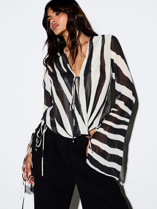 KIZN Zebra Print Sheer Chiffon Blouse With Tie Neck Cowl Detail And Dramatic Flare Sleeves