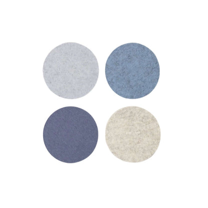 Four round felt coasters in gray, blue, and beige on a white background