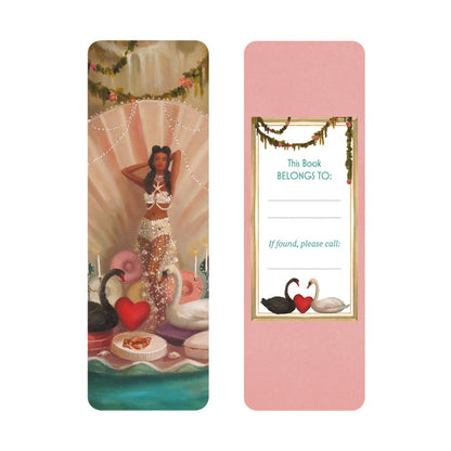 Bookmark with a colorful design of a mermaid and decorative elements on the front and bookplate on the back.