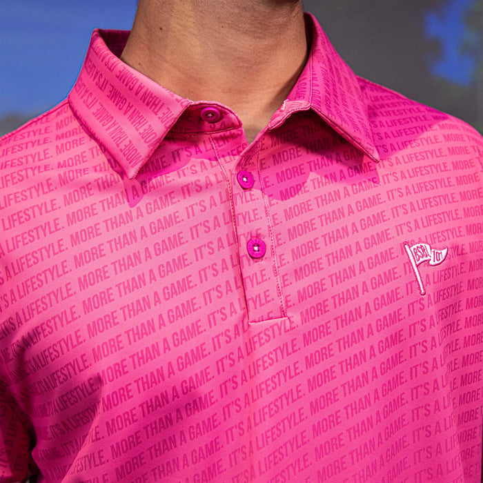 Adult model wearing pink and white More Than a Game Gradient polo