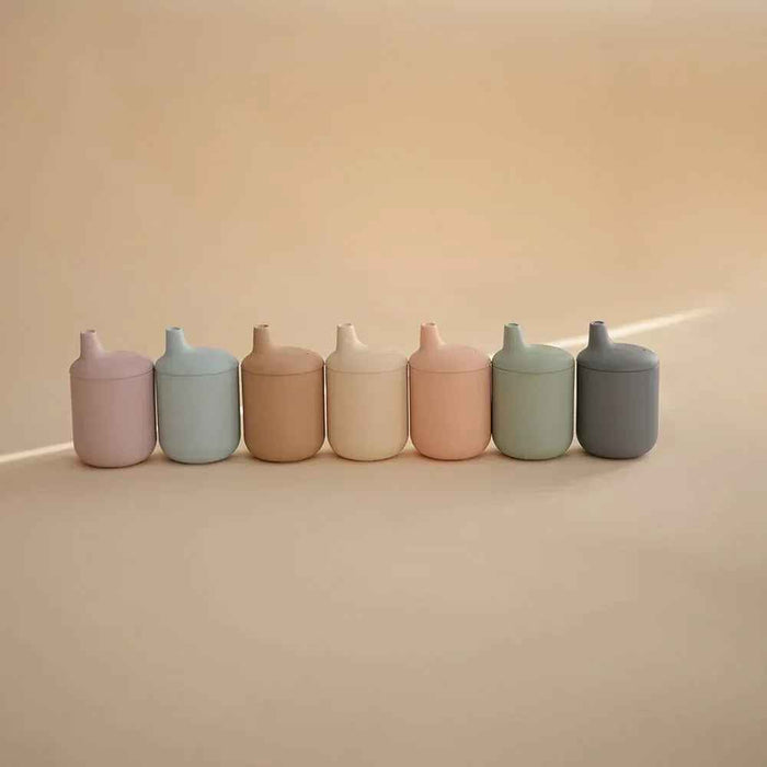 Mushie® Silikonski kozarček s slamico Shifting Sand Mushie