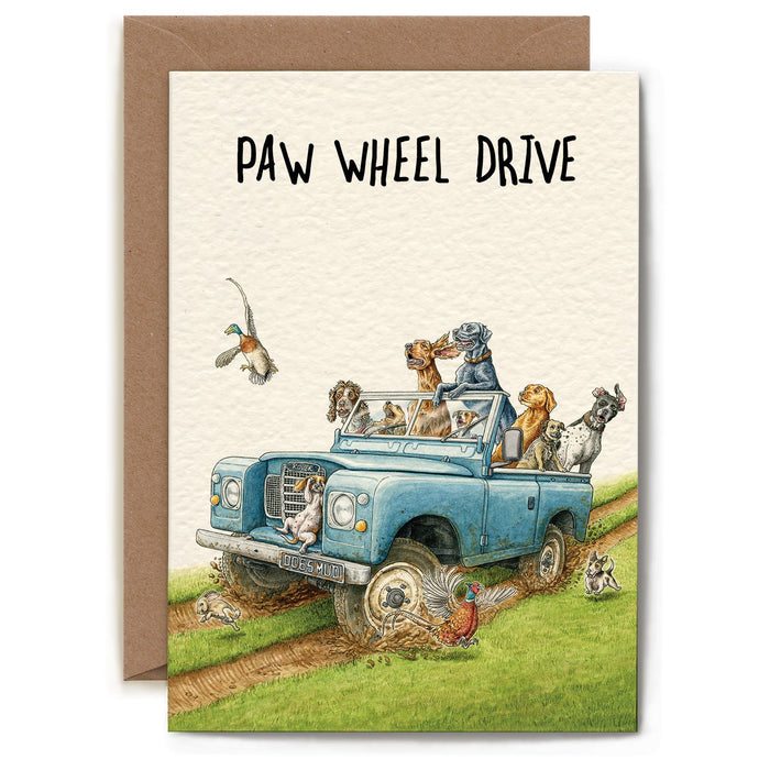 A whimsical illustration of dogs riding in a truck on a dirt road and text that reads "PAW WHEEL DRIVE".