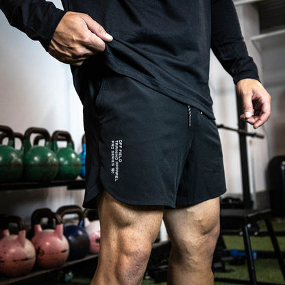Adult model wearing black Pro Series with Liner shorts