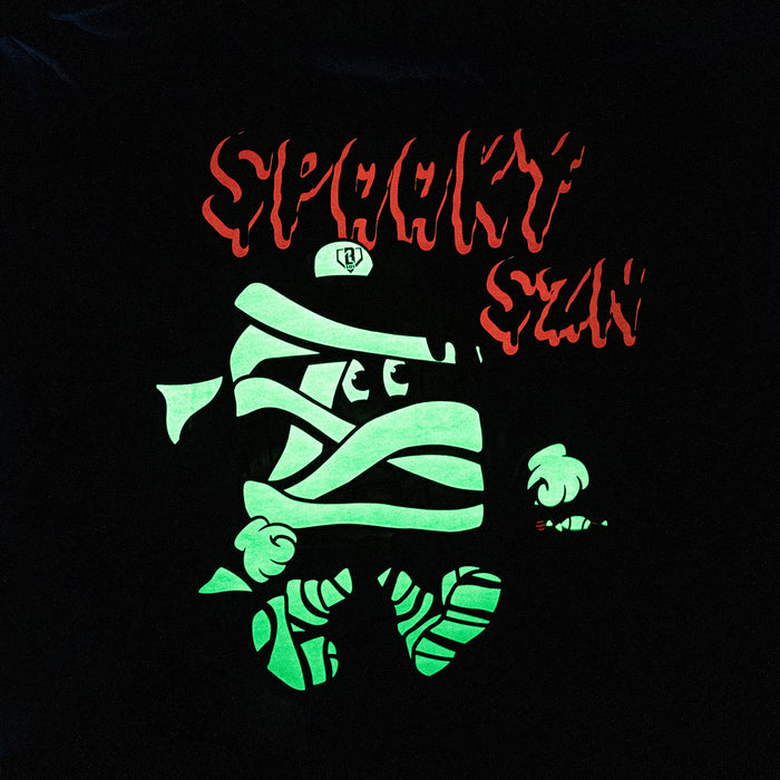 Youth model wearing blue youth graphic tee with "Spooky SZN Waffle" design