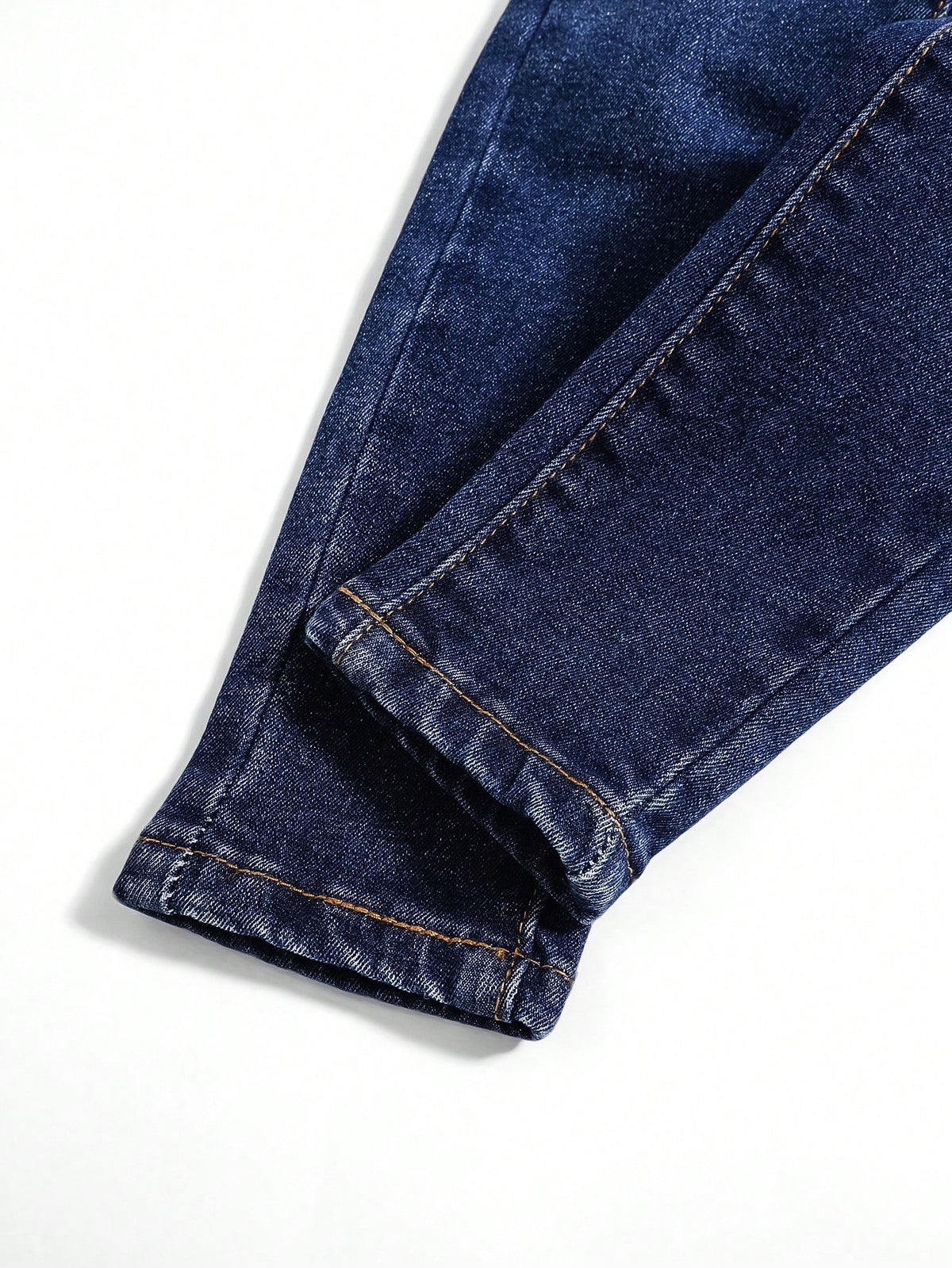 Young Boy Blue Comfortable And Refreshing Dark Wash Cut Out Ripped Frayed Design Elasticity Denim Stretch Skinny Jeans For Dailywear